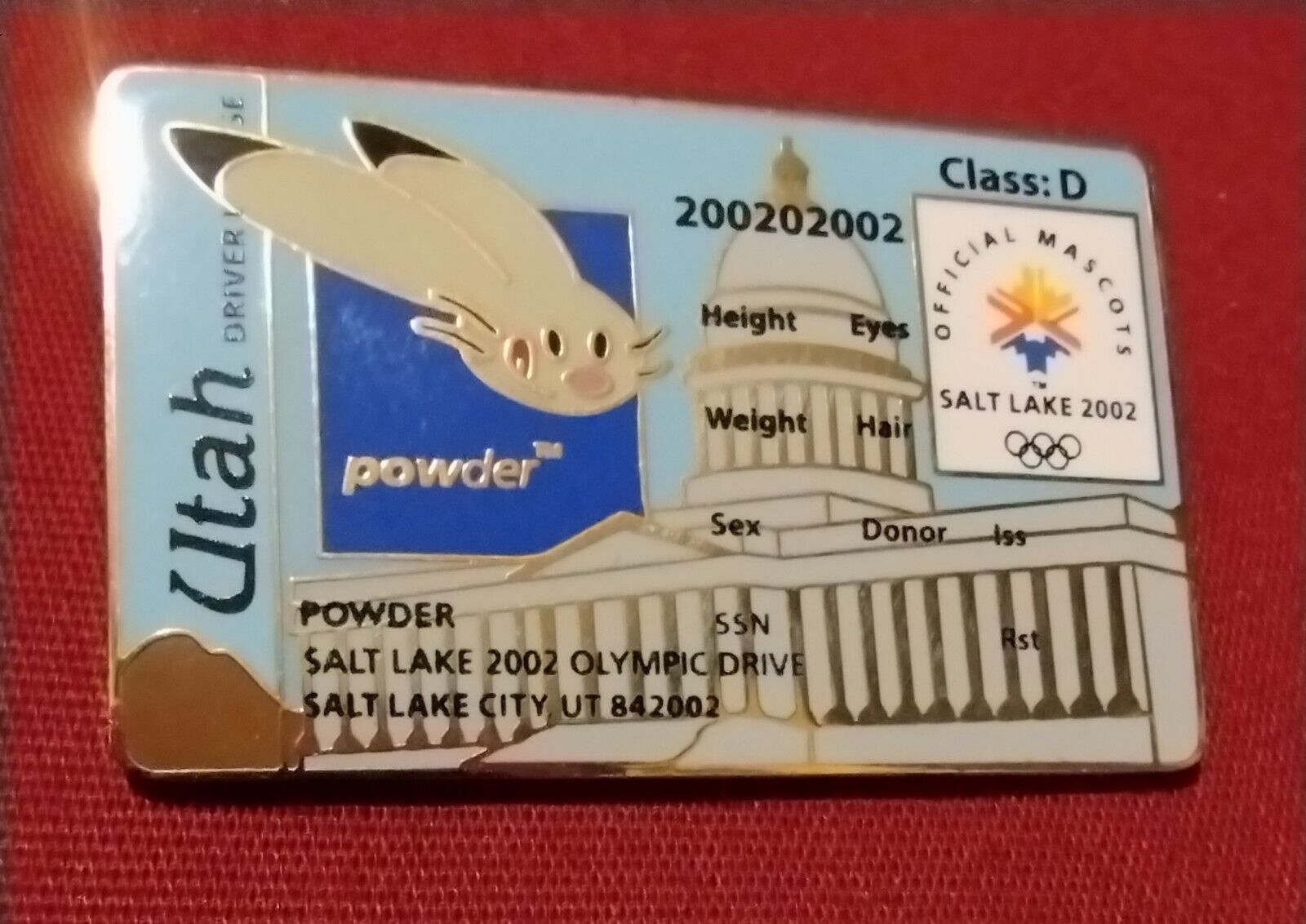 2002 Salt Lake City Olympic Mascot Powder Utah State Drivers License Pin.