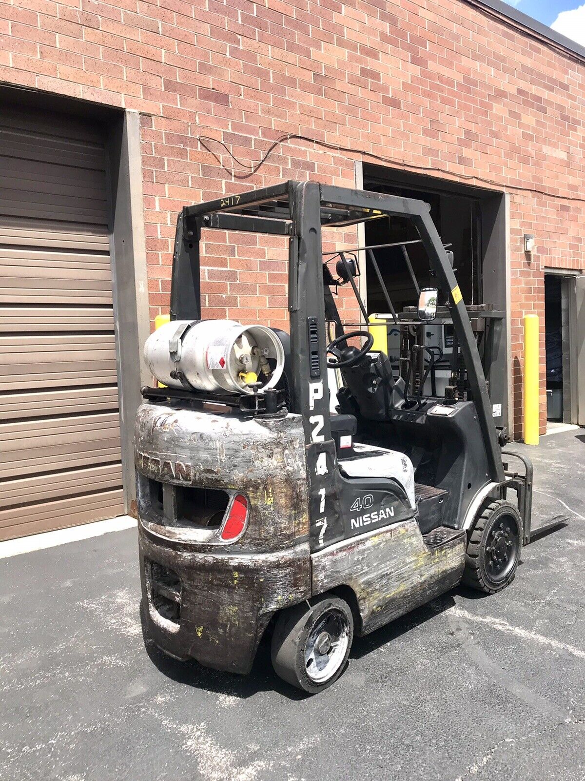 2014 Nissan Forklift Cap. 5000 Lb. Side Shift Double Stages Propane. Propane.
